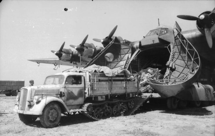 opel-maultier-towing-an-artillery-piece-onto-or-off-an-me-323-741x471.jpg